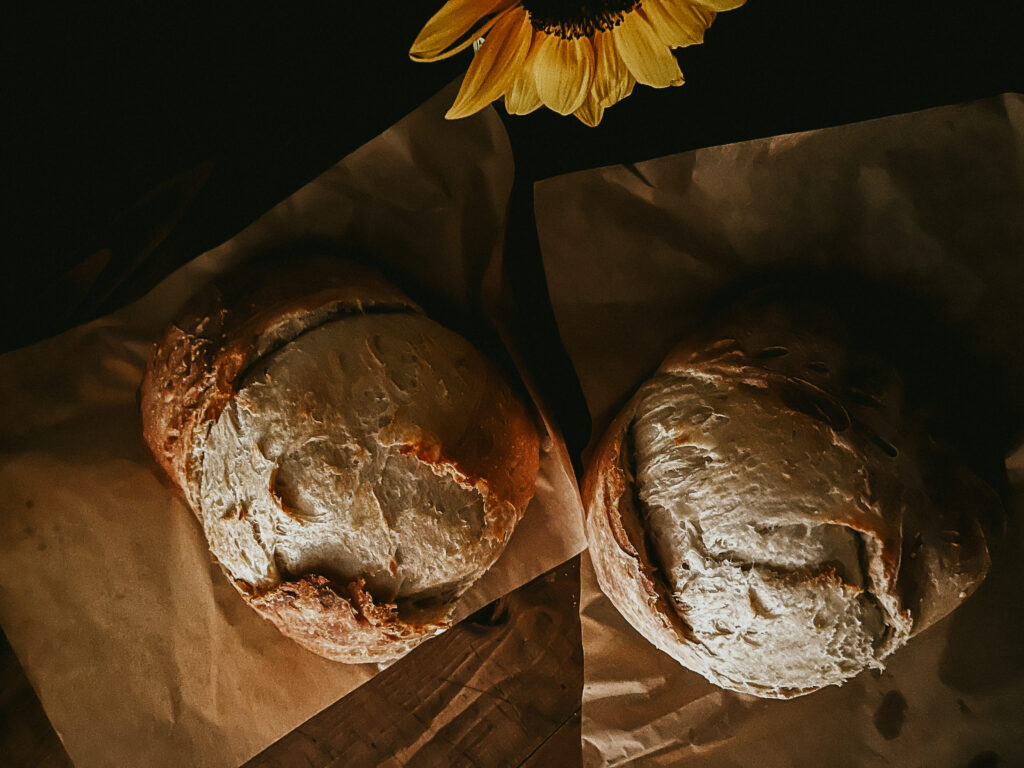 Fresh sourdough bread on a wooden cutting board